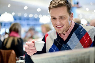 Man reading newspaper